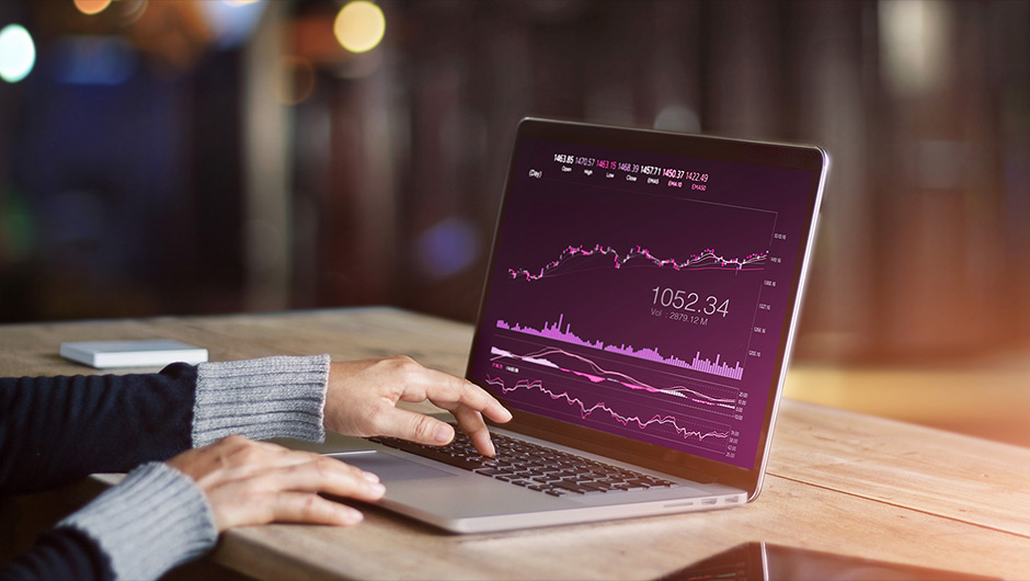 Image of laptop with hands typing