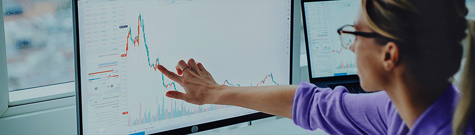 Woman looking at computer monitor