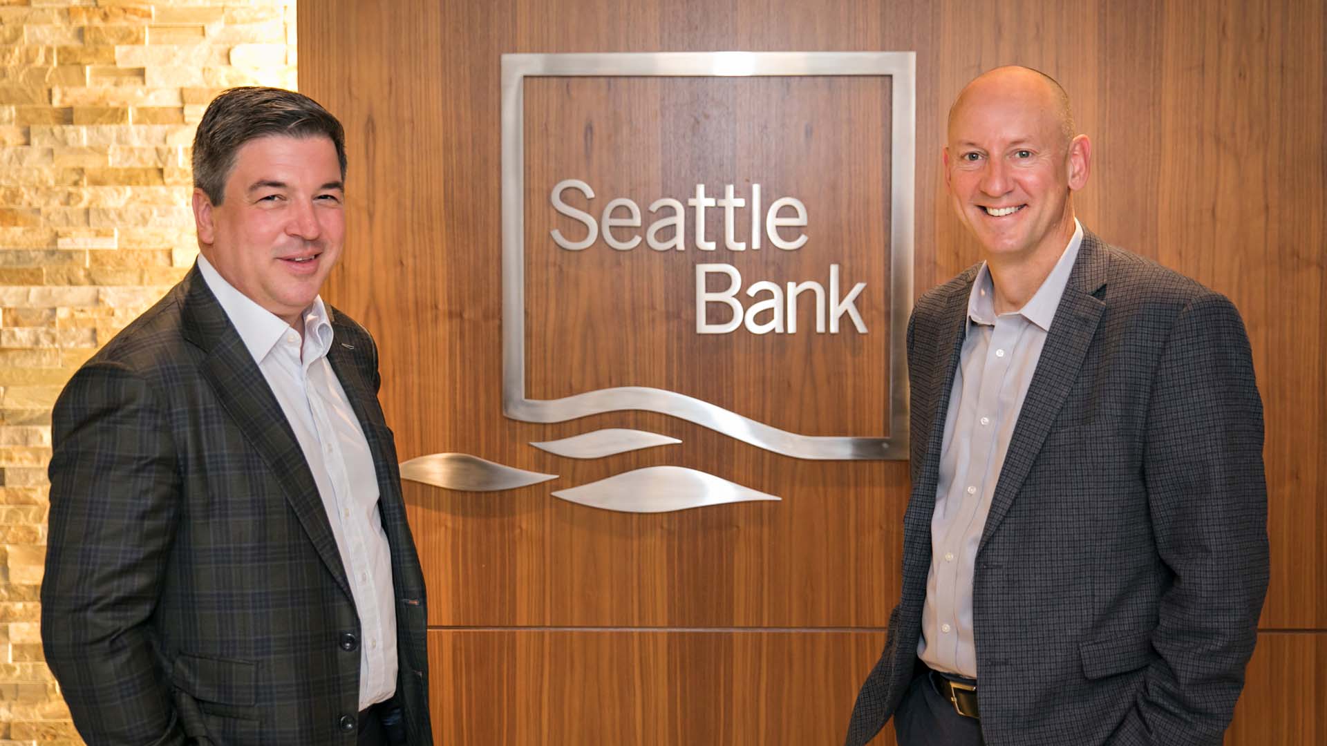 Simon Paris, President, Finastra (L) with John Blizzard, President and CEO, Seattle Bank (R).