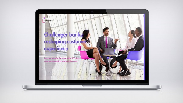 Challenger banks: reshaping customer experience Image of laptop with people talking at table