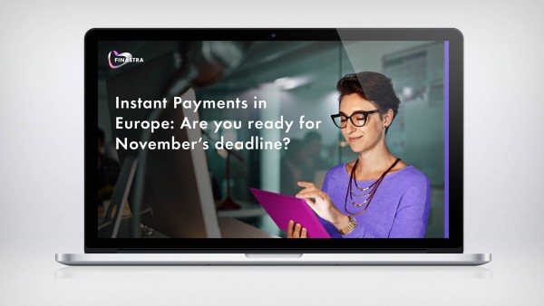 Instant Payments: Are you ready for November’s deadline? Image of laptop with woman with tablet