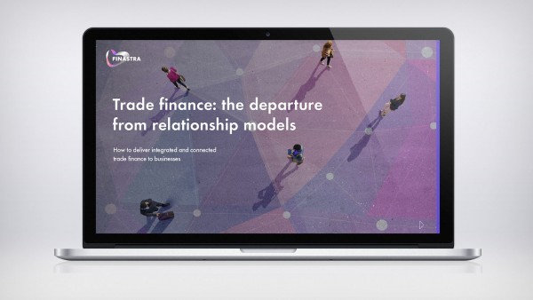 Trade finance: the departure from relationship models Image of laptop with top down view of people walking