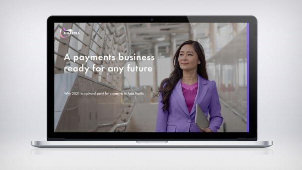 Why 2021 is a pivotal point for payments in Asia Pacific Image of laptop with woman and tablet