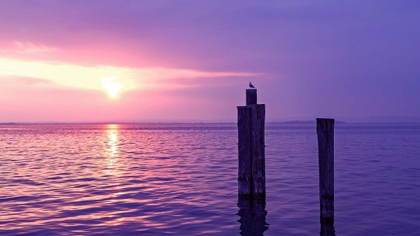 European Payments Initiative: beware of the iceberg Image of sunset over water