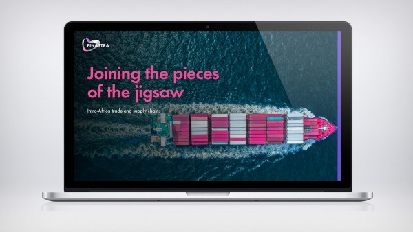 Joining the pieces of the jigsaw: Intra-Africa trade and supply chains Image of laptop with image of cargo ship in ocean