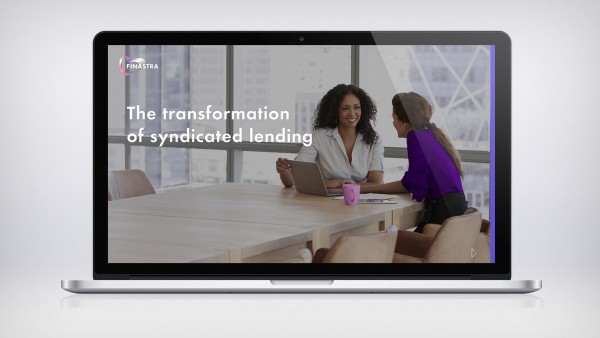 The transformation of syndicated lending Image of two woman at table with laptop