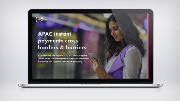 APAC instant payments: crossing borders and barriers Image of laptop with woman on phone