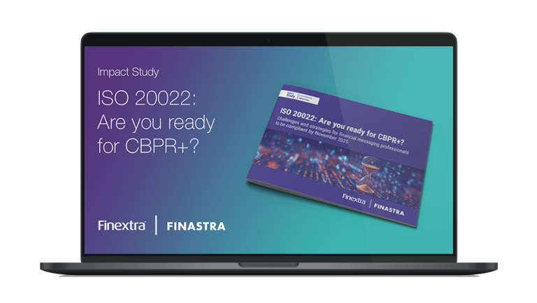 Image of laptop with cover slide for "ISO 20022: Are you ready for CBPR+?" white paper