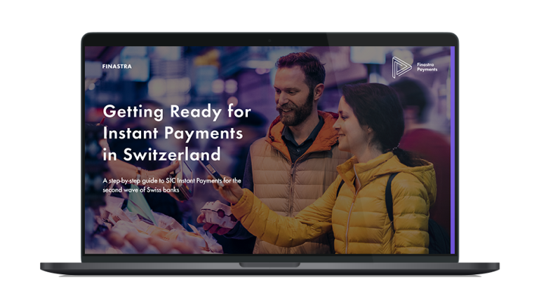 Image of laptop with cover slide of "Getting Ready for Instant Payments in Switzerland" ebook