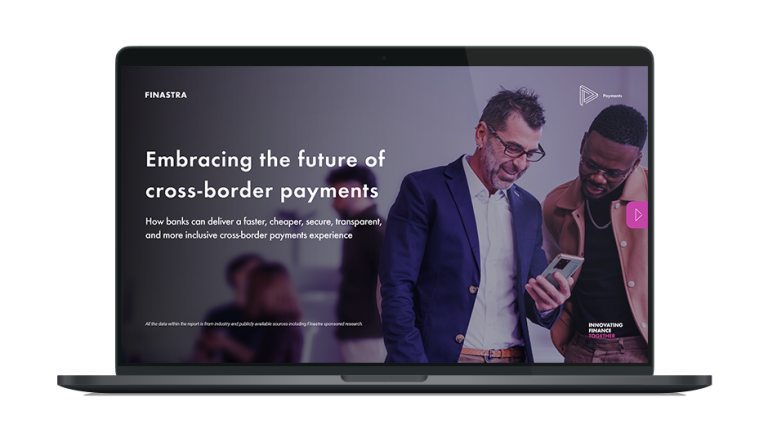 Image of laptop with cover slide of "Embracing the future of cross-border payments" report
