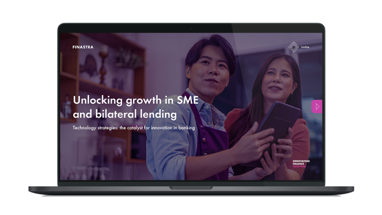 Image of laptop with cover slide of "Unlocking growth in SME and bilateral lending" white paper