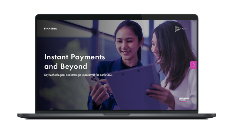 Image of laptop with cover slide of "Instant Payments and Beyond: Key technological and strategic imperatives for bank CIOs" white paper