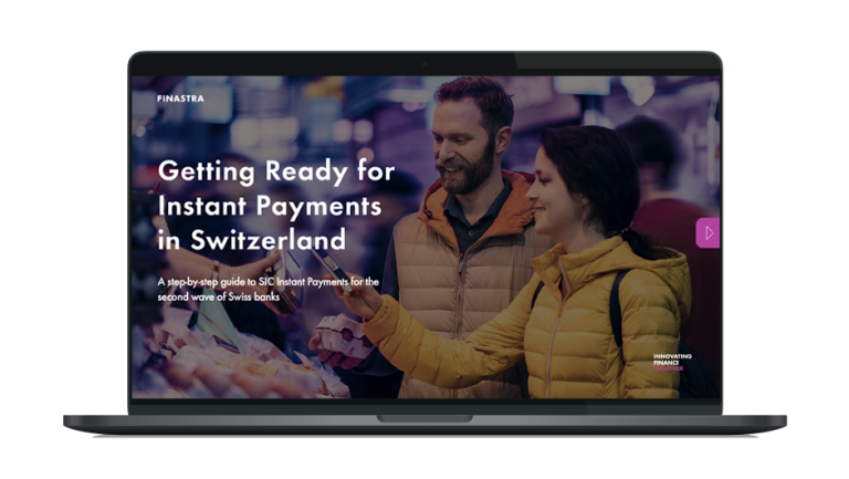Image of laptop with cover slide of "Getting Ready for Instant Payments in Switzerland" ebook