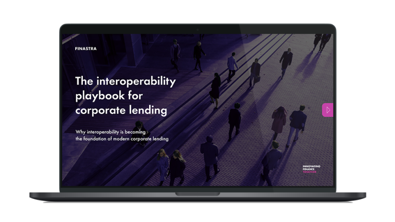 Image of laptop with cover slide of "The interoperability playbook for corporate lending" white paper