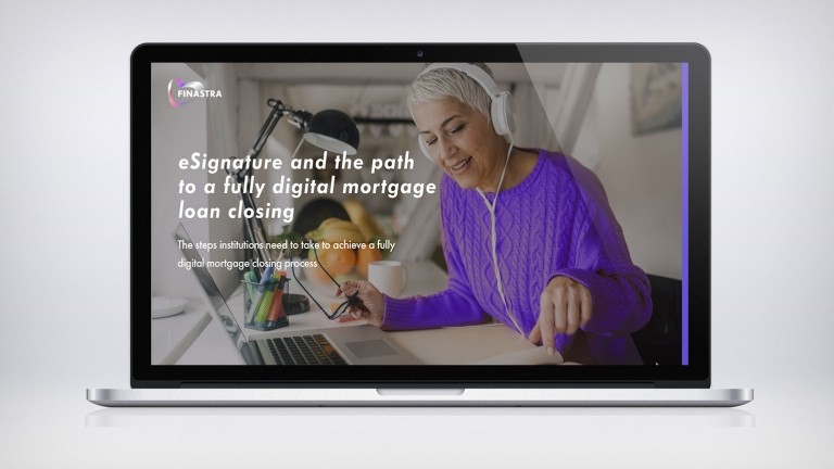 Woman with headphones at desk