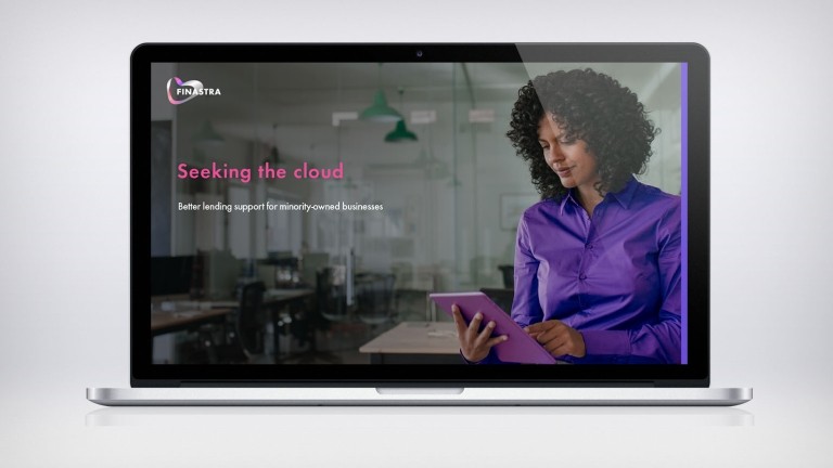 Image of laptop with woman and tablet