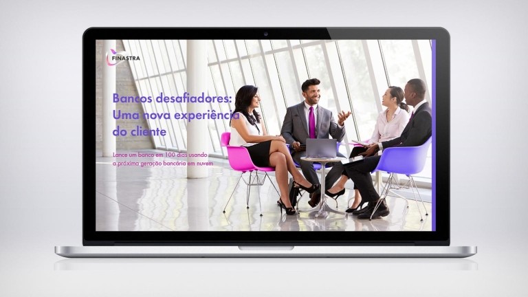 Image of laptop with 4 people at table