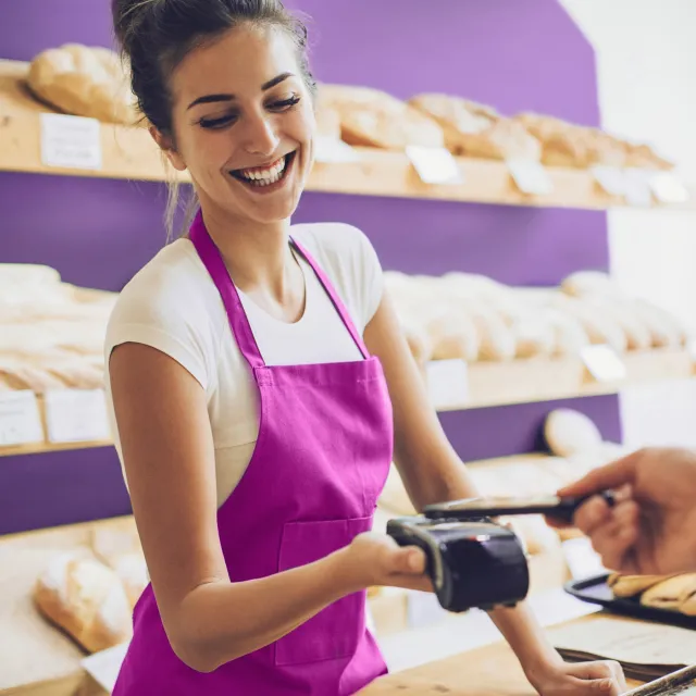 Woman taking phone transaction