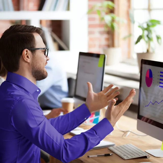 Image of man analyzing charts