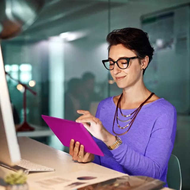 Image of woman working on a tablet