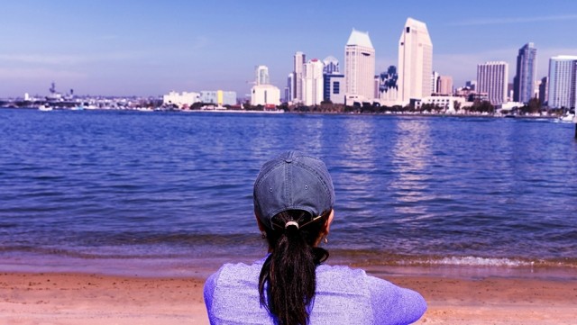 Image of woman looking at the city horizon