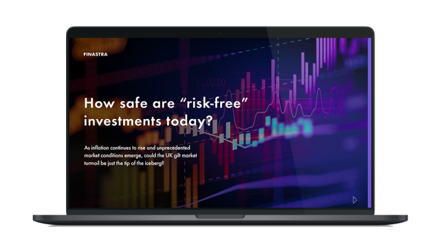 Image of laptop with cover slide for "How safe are 'risk‑free' investments today?" white paper