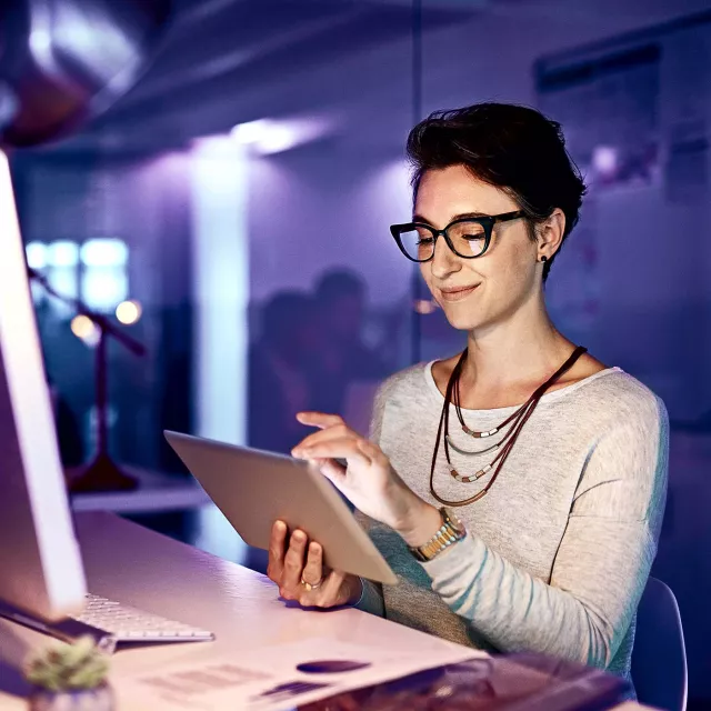 Image of a woman using a tablet