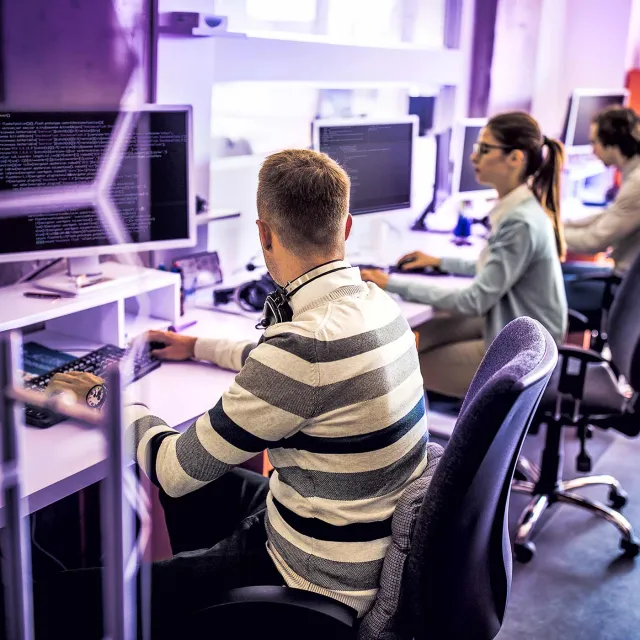 Image of people working in an office