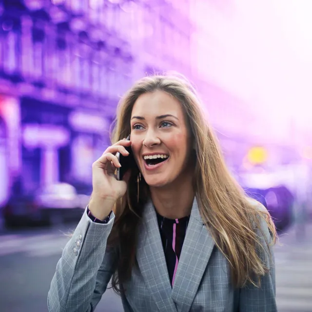 Image of woman on a mobile phone call outdoors
