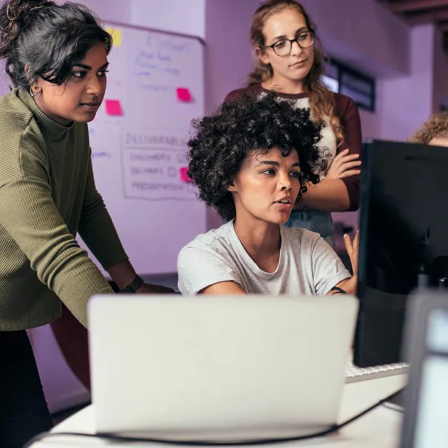 Team collaboration in a modern office setting.