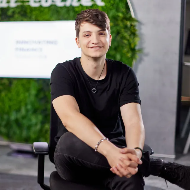 Image of man smiling in an office