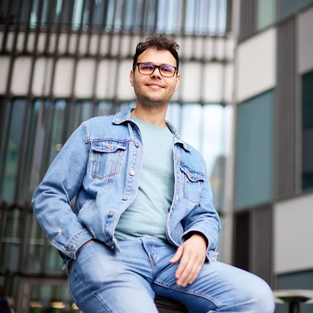 Image of man outside an office