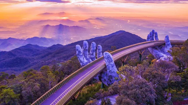 Image of a bridge supported by hand figures