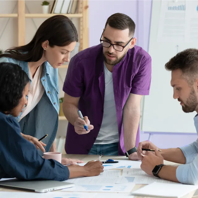 Image of team discussing