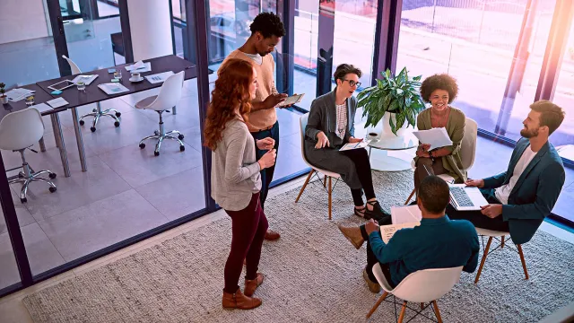 Image of team enjoying a discussion