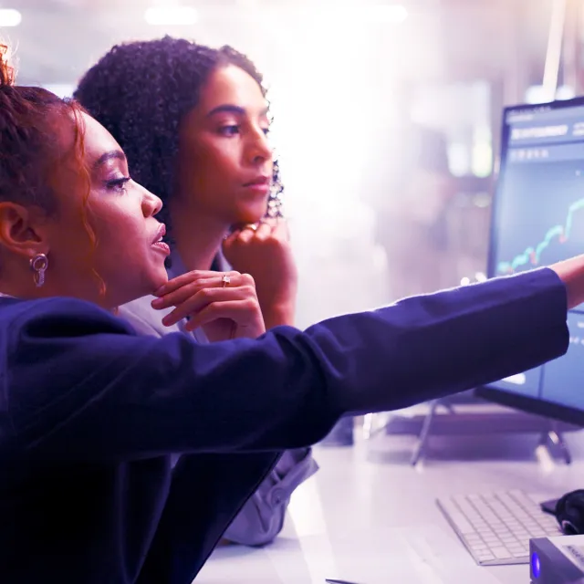 Teamwork, statistics and business women on computer in office for stock trading, research and finance. Collaboration, fintech and people on pc screen with graph, financial chart and data analysis