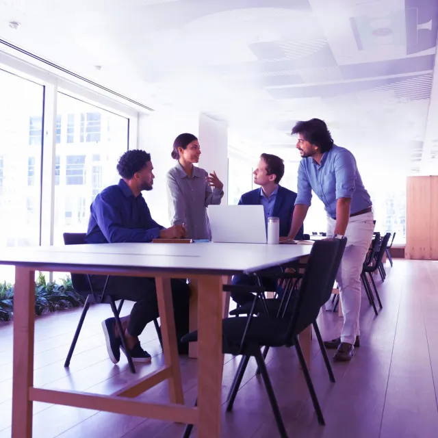 Image of a team meeting