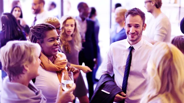 Image of attendees talking after a conference