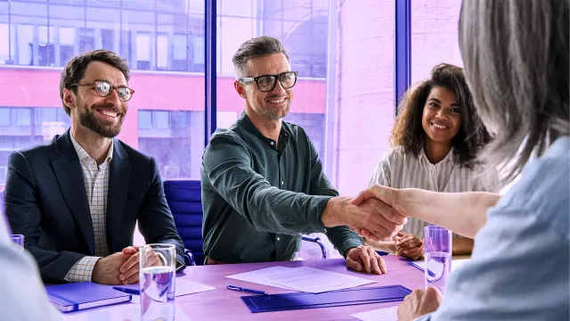 Banking professionals discussing support services for clients