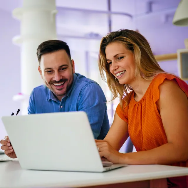 Mortgage professionals using digital mortgage origination software to streamline the home loan application process