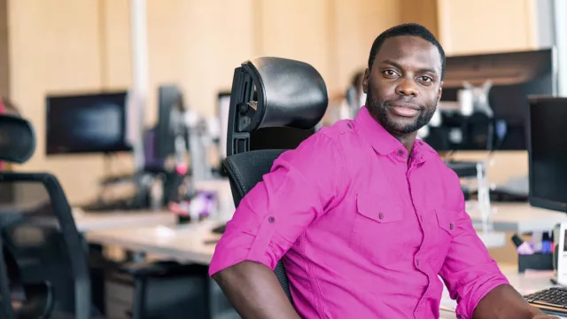 Man sitting in office chair