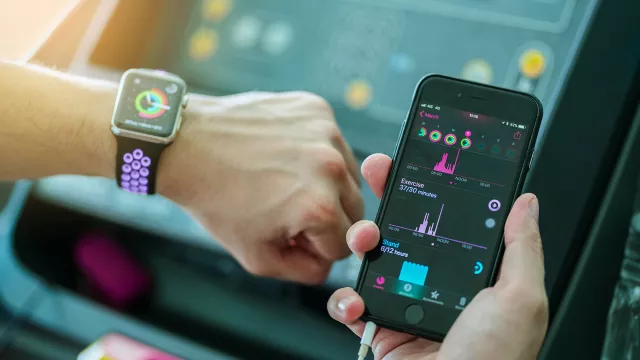 Image of digital watch and phone
