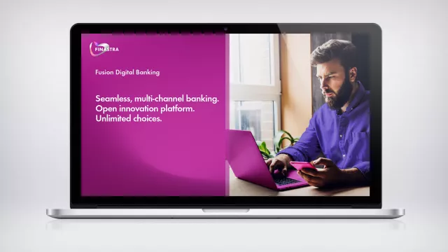 Image of laptop with man with laptop and phone