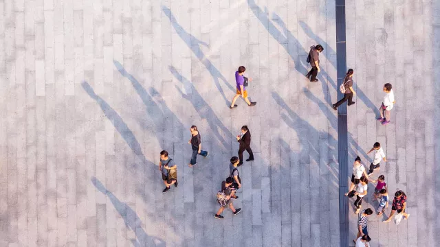 Image of top down view of people walking