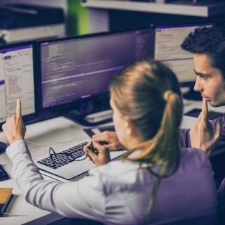 Two developers working in an office