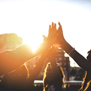 People high-fiving