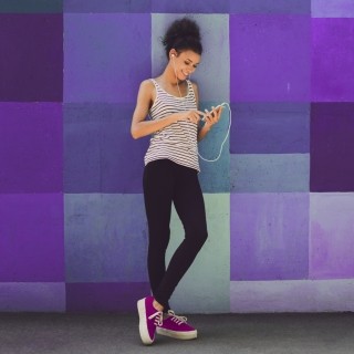 Woman smiling at phone