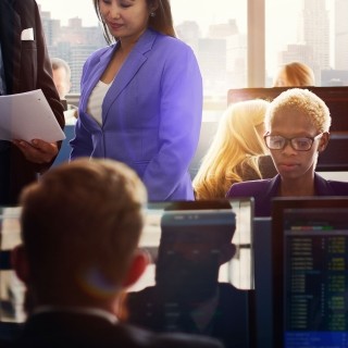 Image of people working in the office