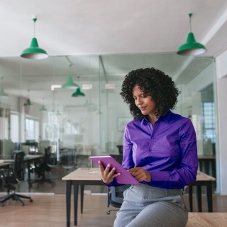 Image of woman working on a tablet