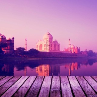 Image of a mosque across a riverbank